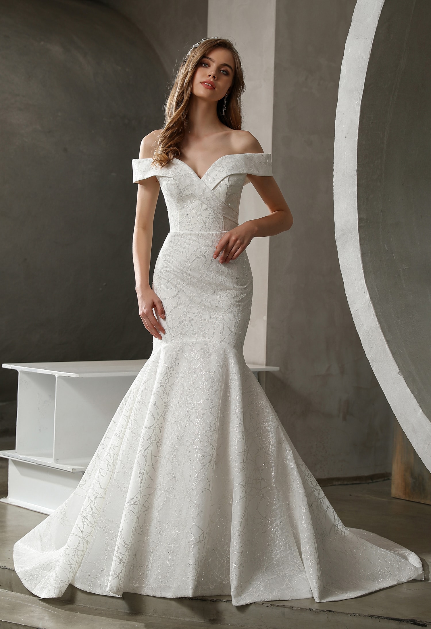 Bride in a glamorous sparkle sequin fitted wedding gown