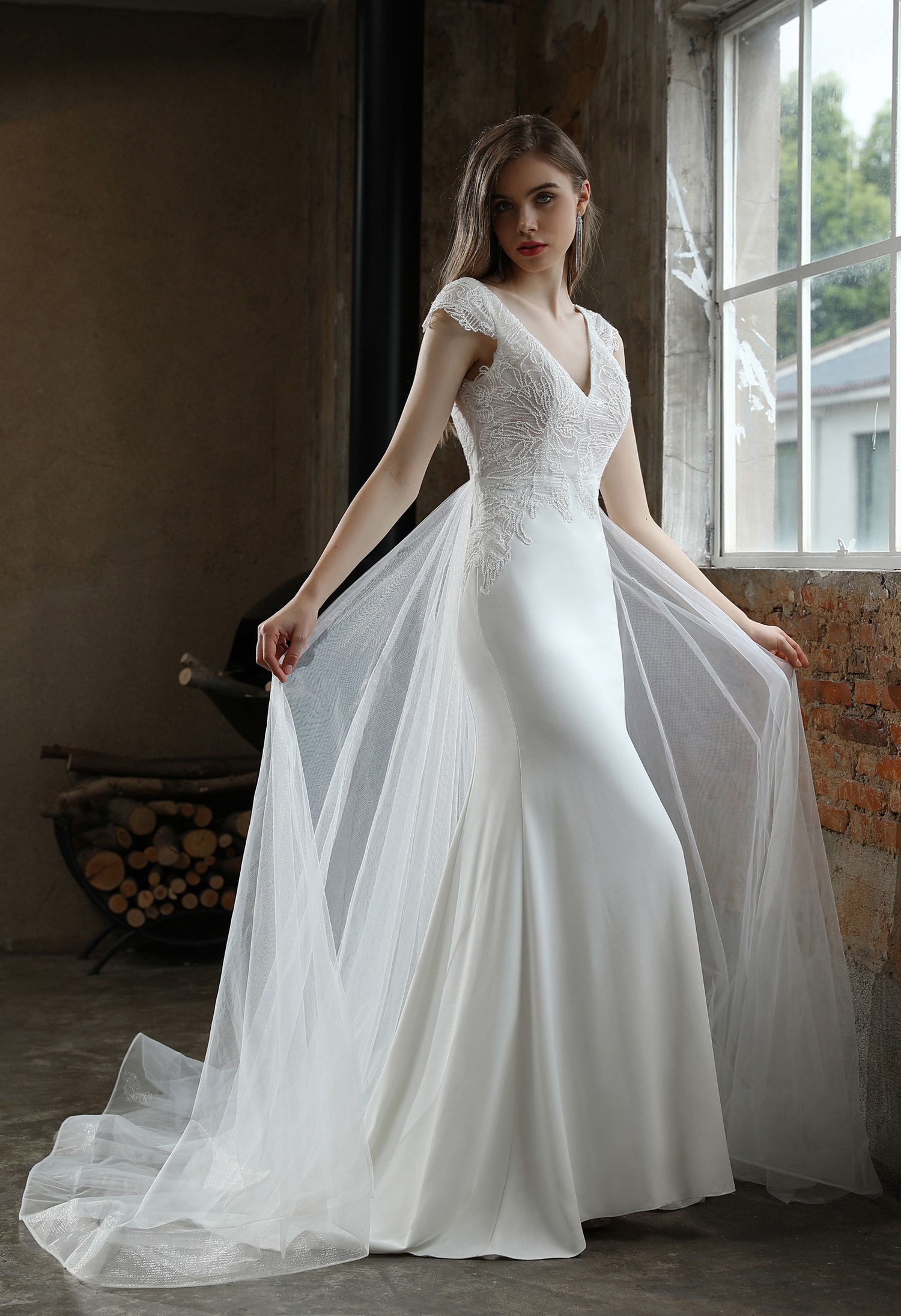 Bohemian bride in a flowy wedding dress with floral crown