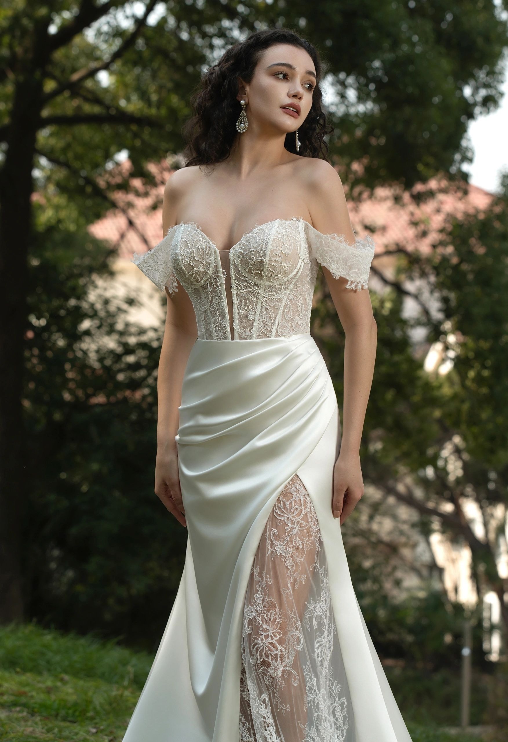 Bridal gown with floral lace and sheer flutter sleeves