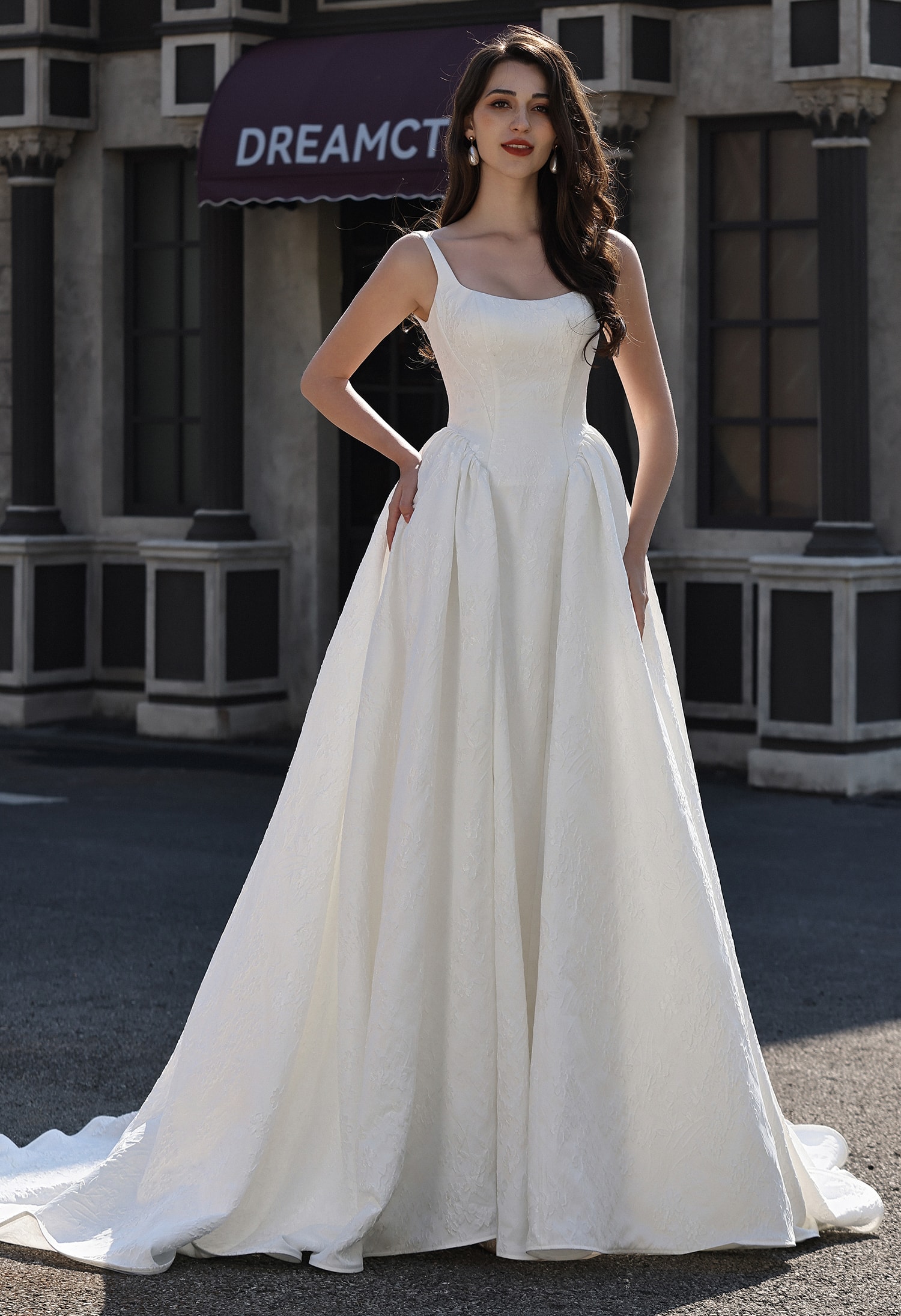 Bride in a strapless sweetheart neckline white wedding dress