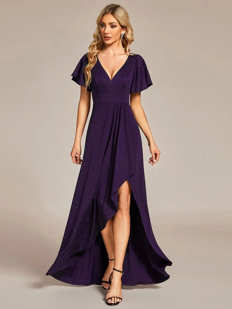 Bridesmaid in a sage green flowy chiffon gown