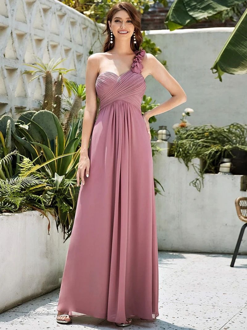 Bridesmaid in a burgundy formal gown